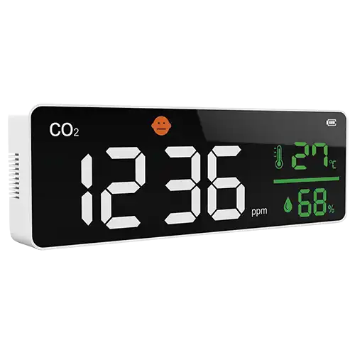 Medidor de CO2 de pared digital con pantalla LCD indicando temperatura y humedad para negocios.